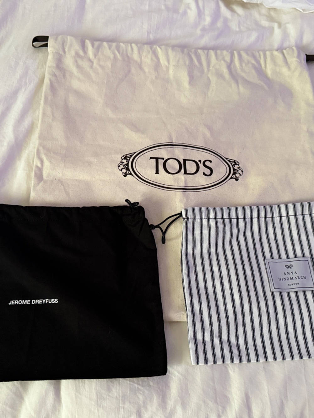 Tod's Cream & Black Drawstring Dust Bags Set